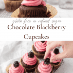 Gluten Free Blackberry Chocolate Cupcakes with pink frosting and fresh blackberry garnish