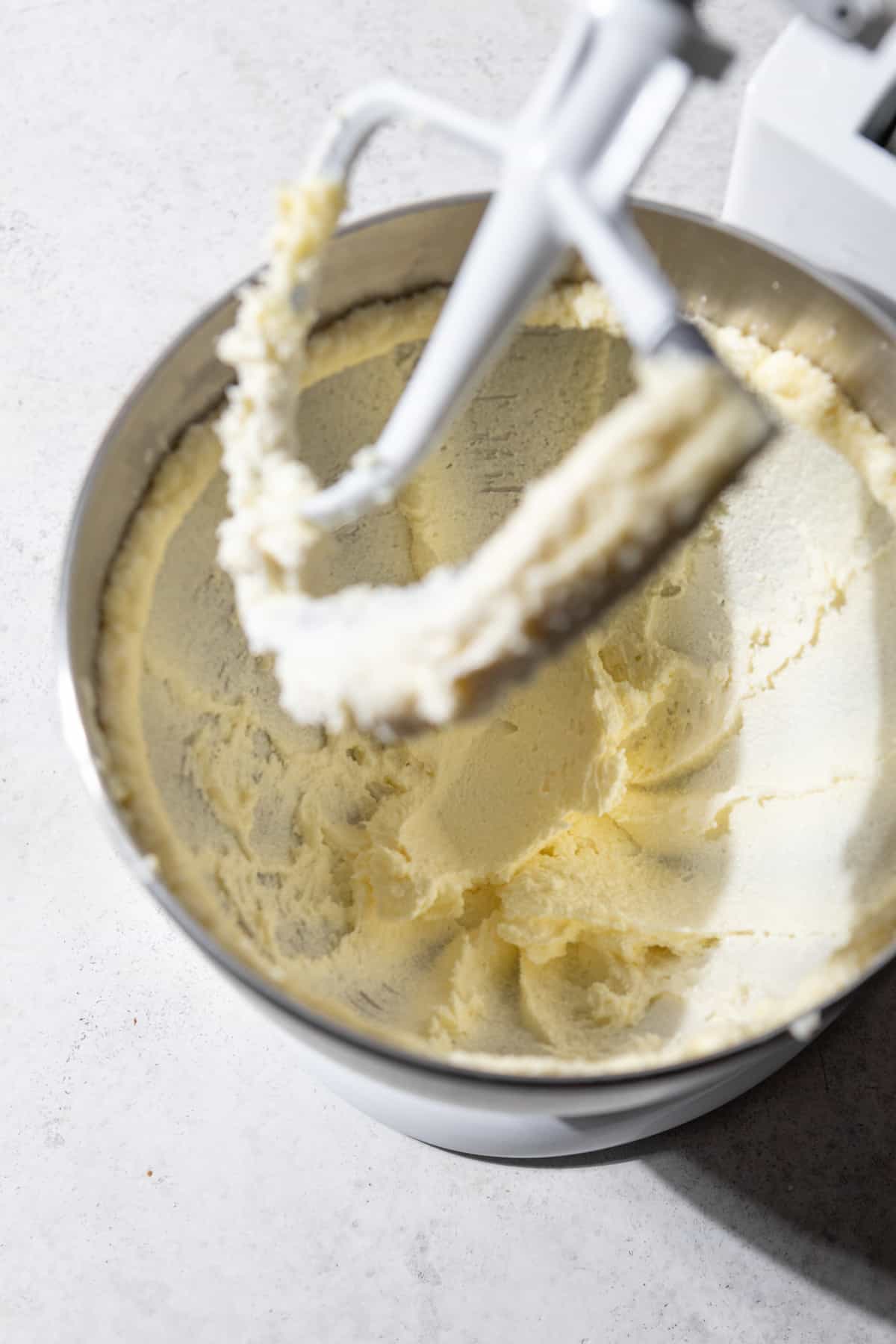 Creamed butter and sugar in the bowl of a stand mixer.