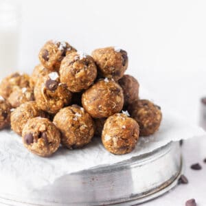 Pumpkin protein balls stacked on top of each other.