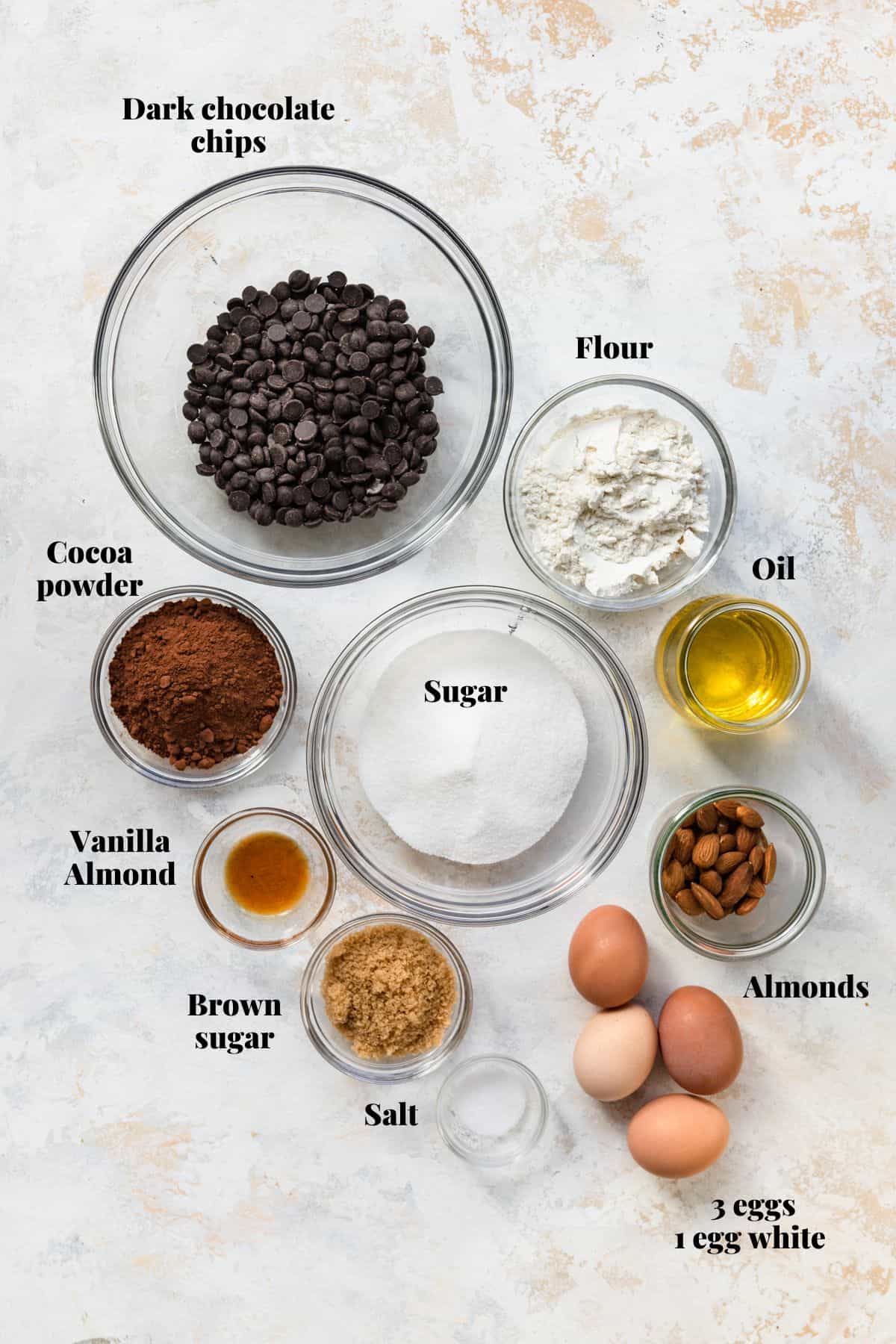 Ingredients needed to make chocolate brownies with almonds.
