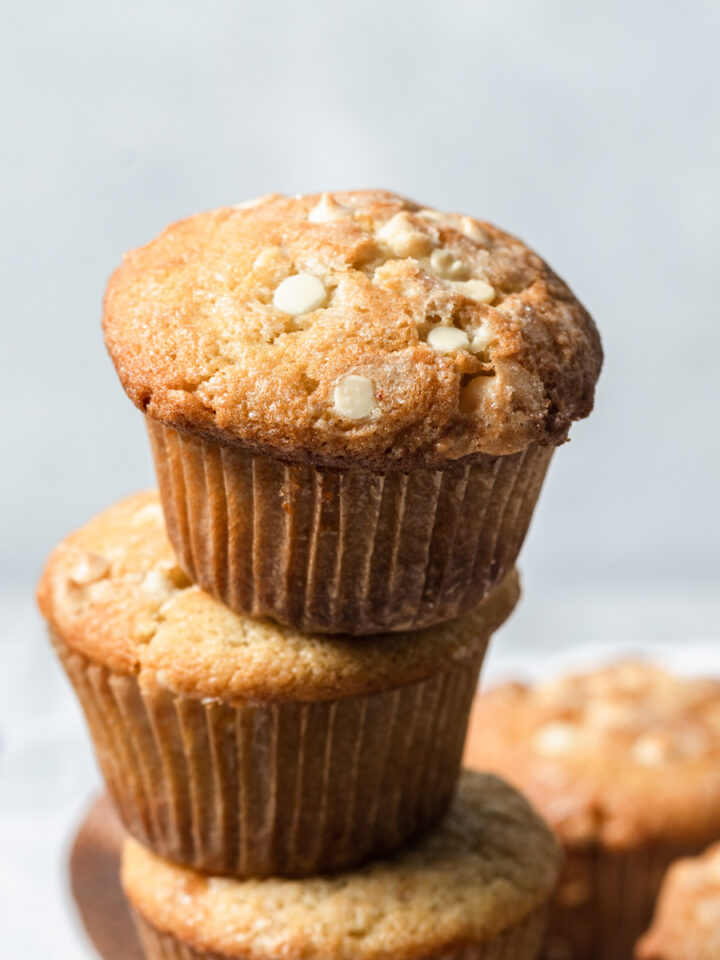 A stack of white chocolate chip muffins.