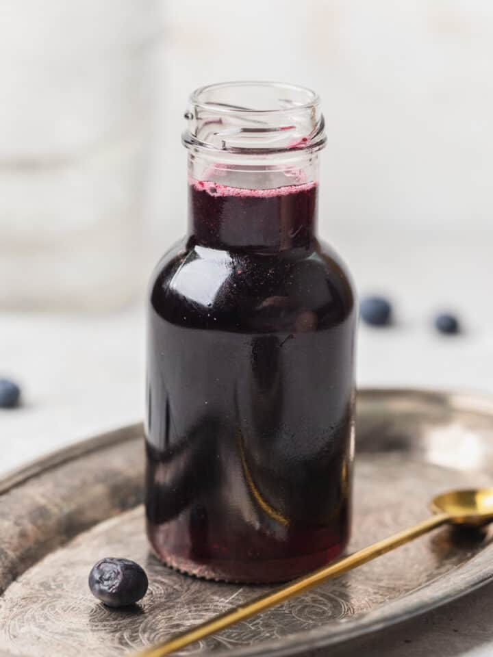 A jar of blueberry simple syrup.