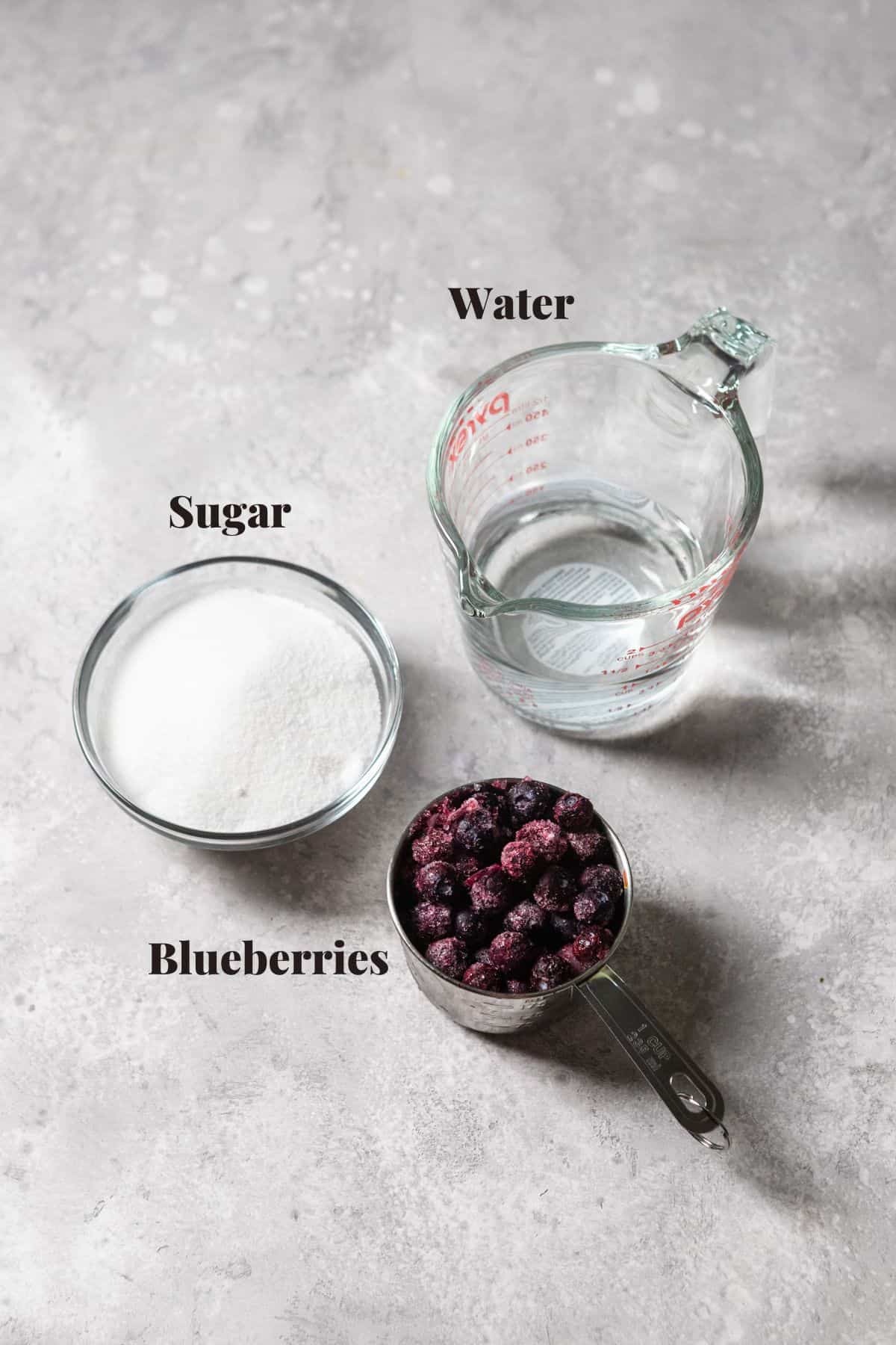 Ingredients to make blueberry simple syrup.