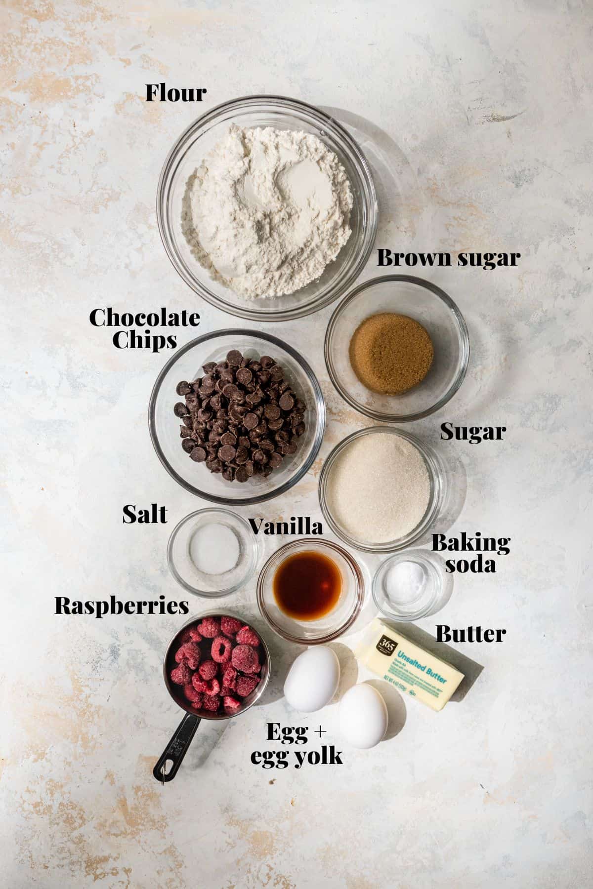 Ingredients to make cookies on a surface.