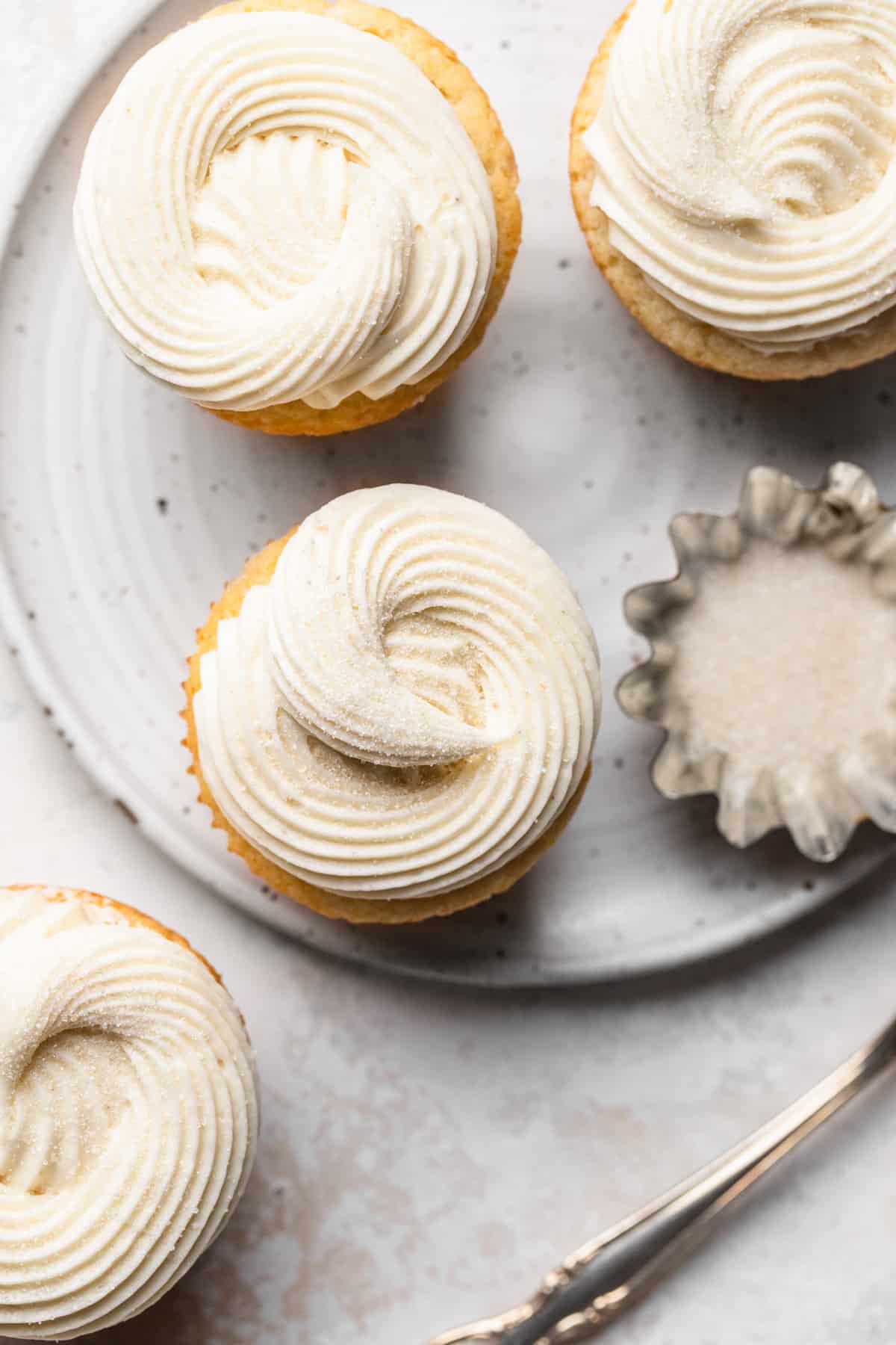 Basic vanilla cupcakes on a plate.