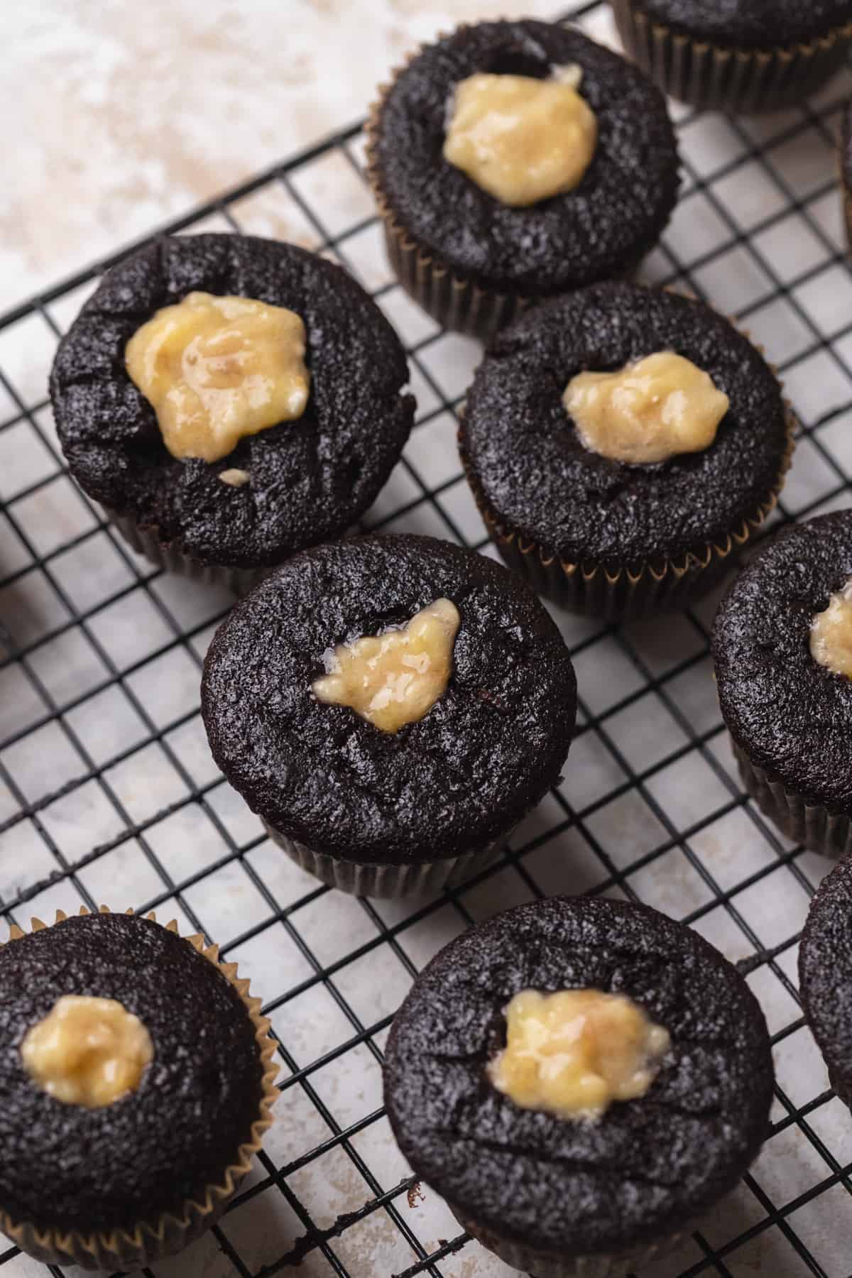 Chocolate cupcakes filled with banana puree.