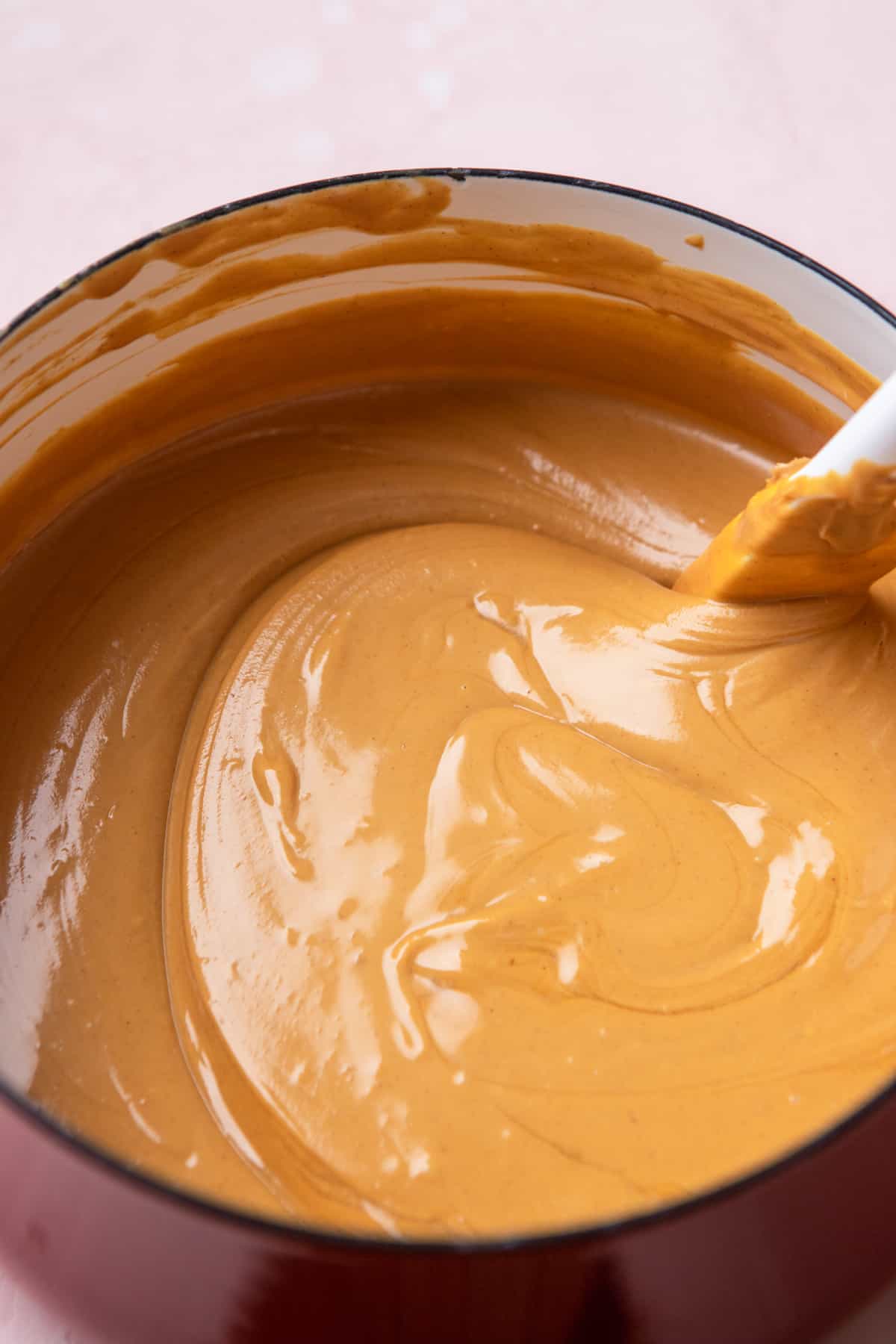 Melted peanut butter in a pot.