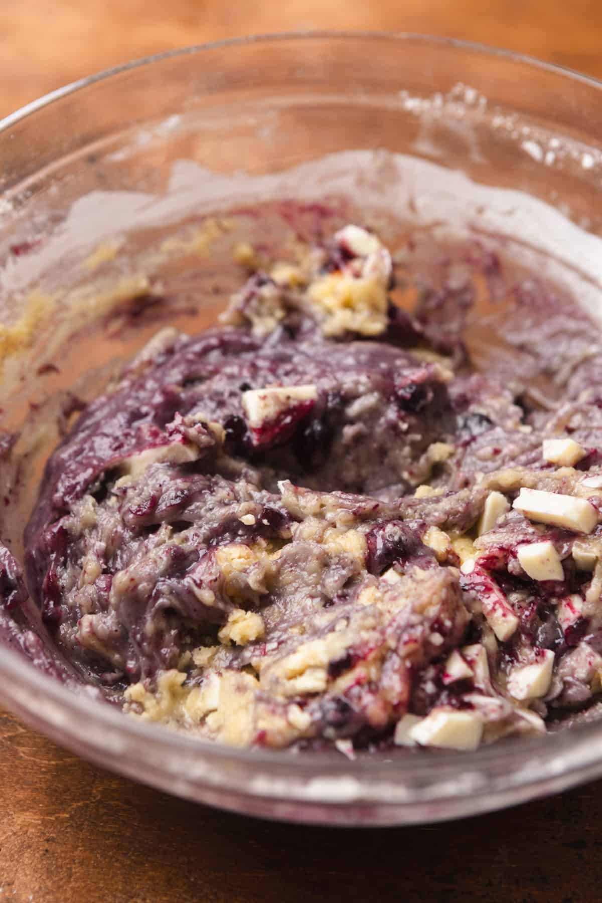 Blueberry white chocolate cookie dough in a bowl.