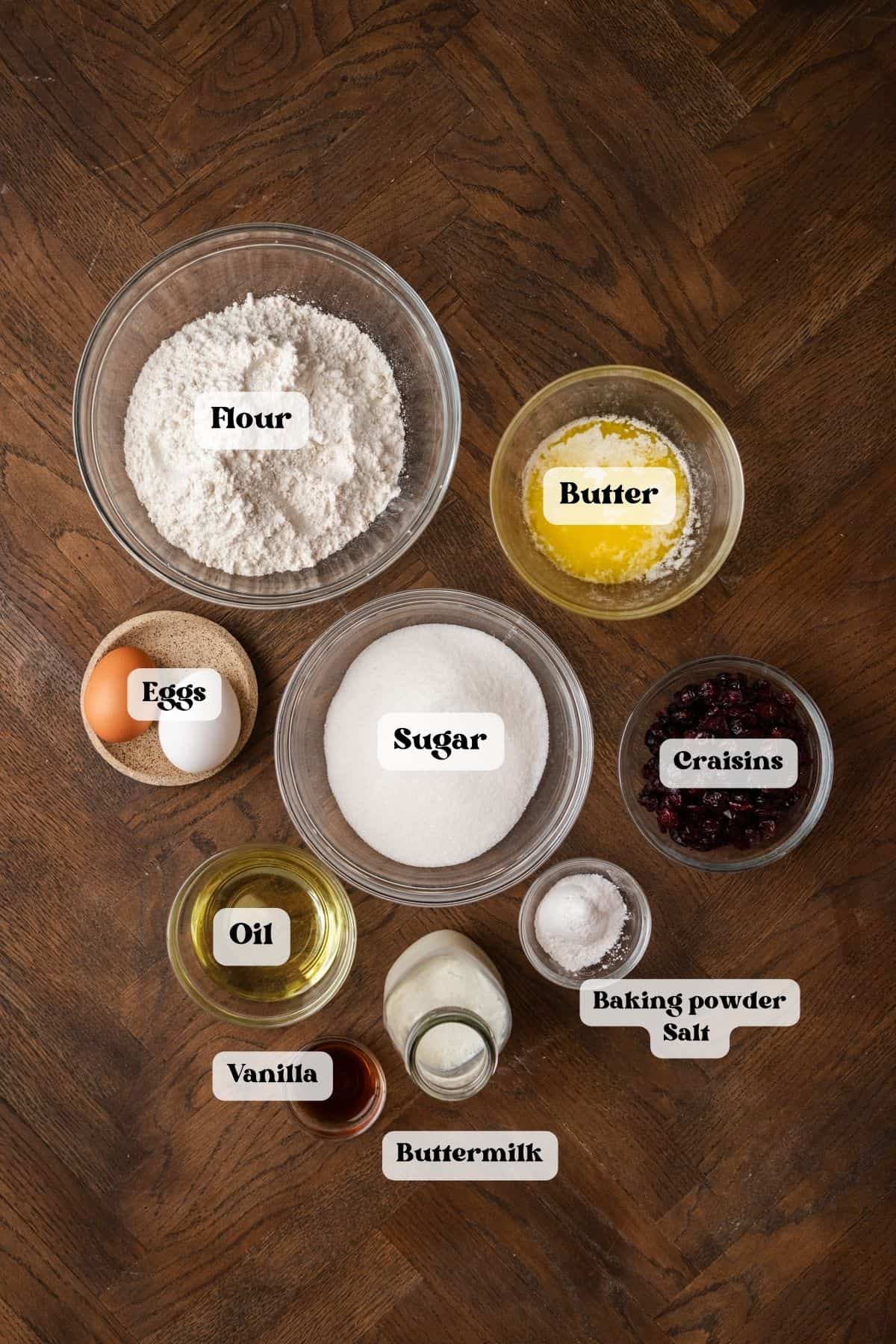 Ingredients to make muffins with craisins.