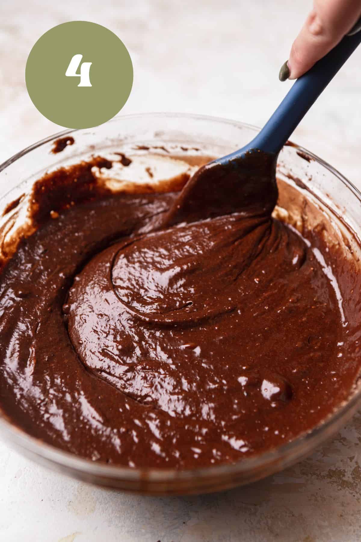 Brownie batter in a large mixing bowl.