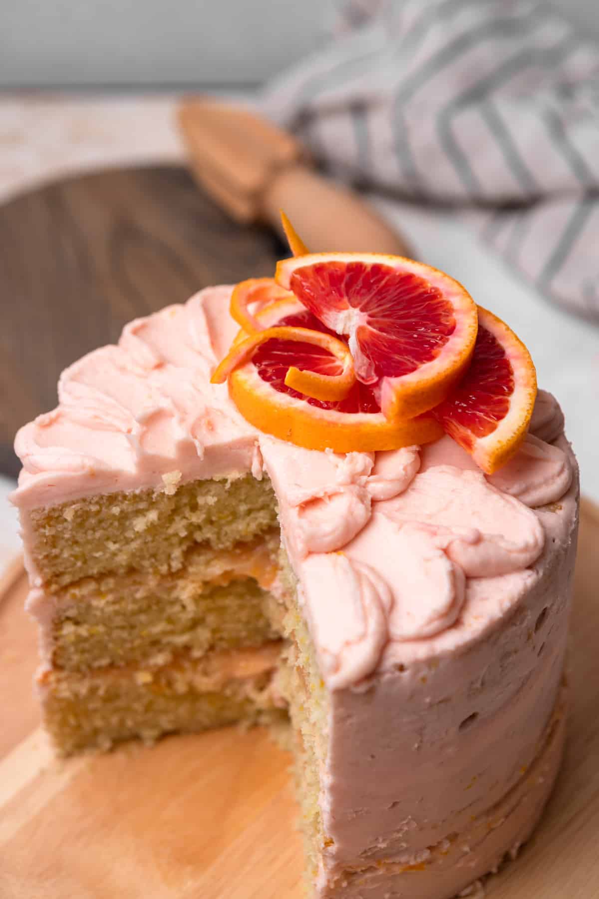 A blood orange cake cut open to show texture.