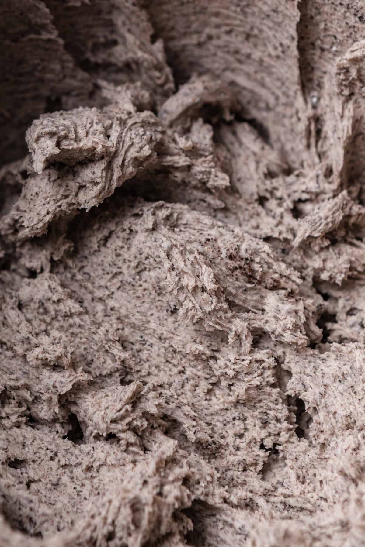 Macro photo of cream cheese frosting made with Oreos.