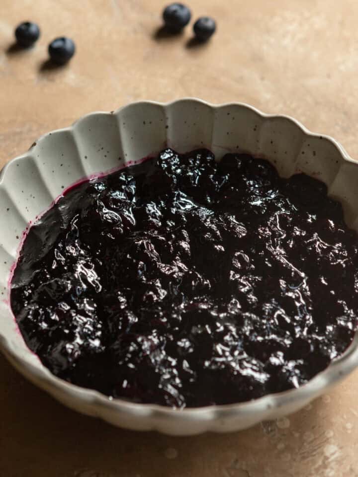 Blueberry filling for cakes in a bowl.