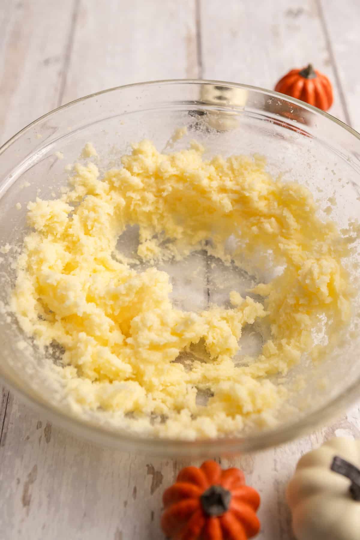 Creamed butter and sugar in a bowl.
