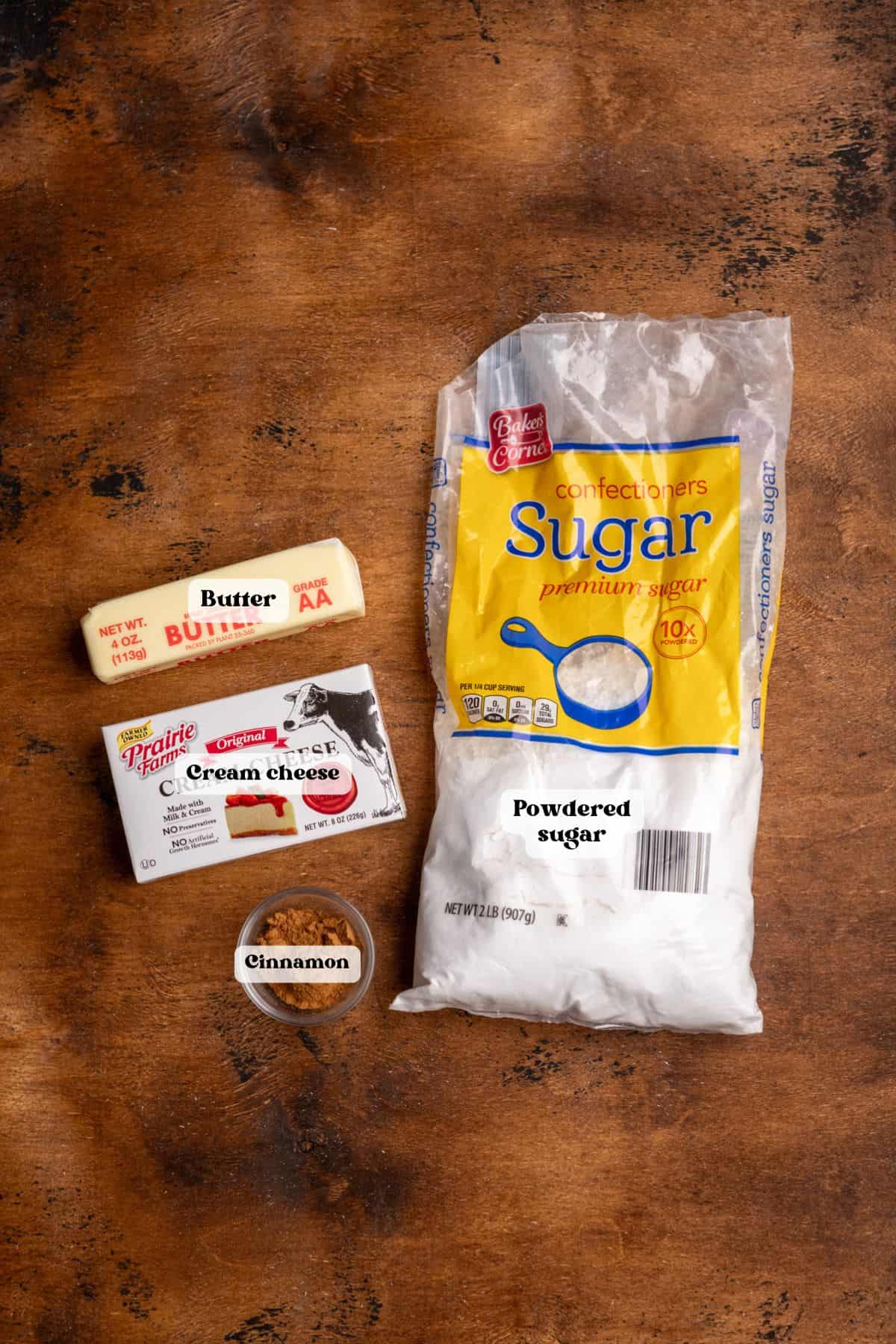 Ingredients to make cinnamon cream cheese frosting.