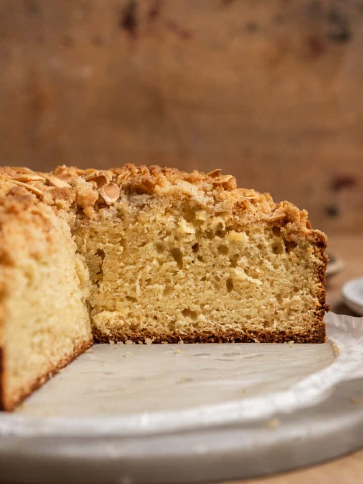 Almond coffee cake cut open to show texture.