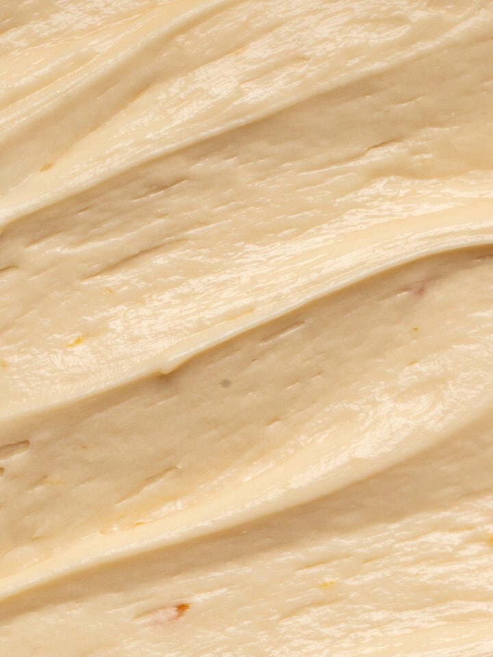 Close up of honey cream cheese frosting swirls.