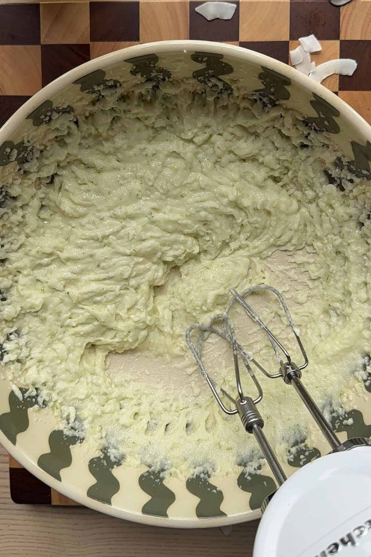 Butter, lime zest, and sugar creamed in a large bowl.