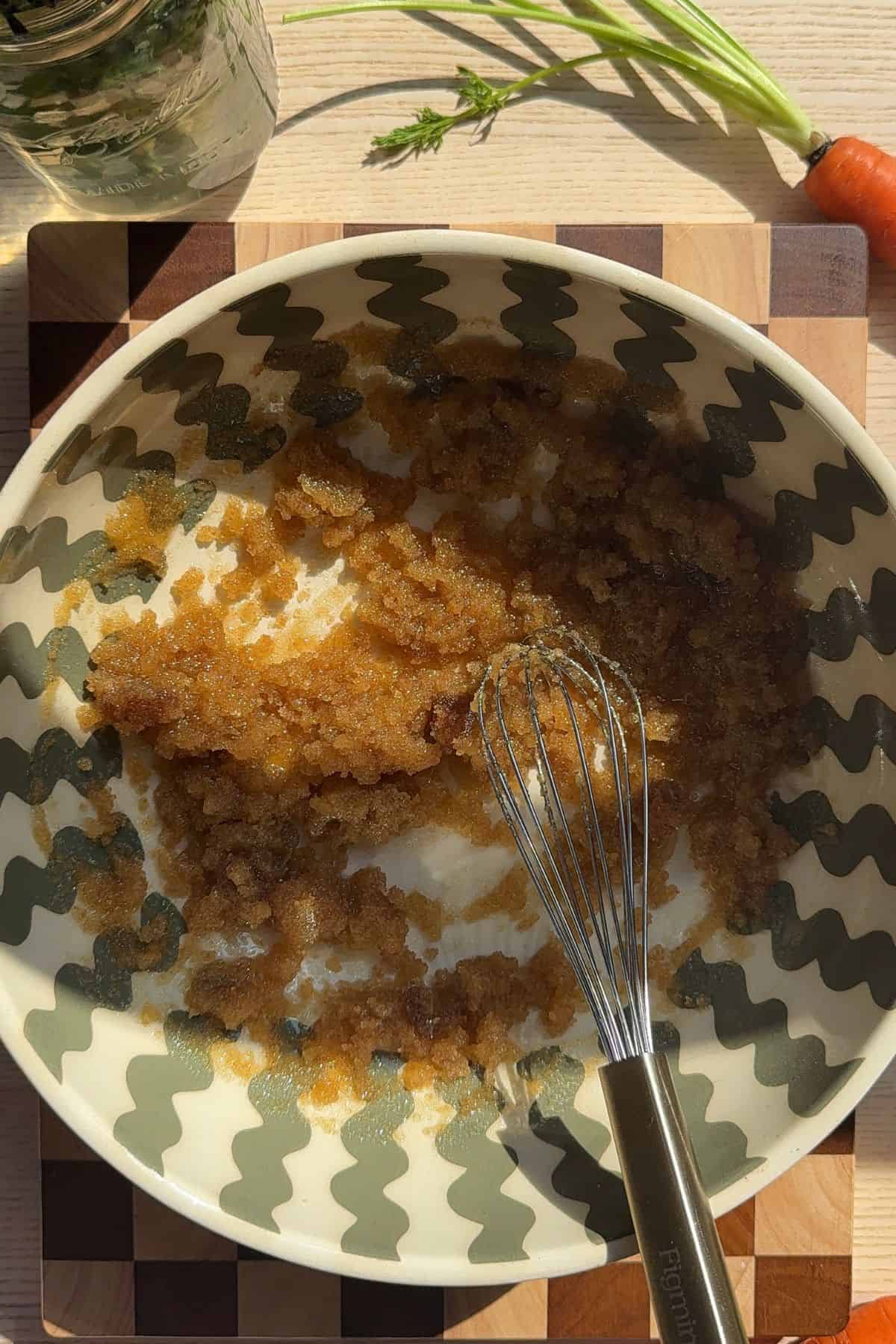 Sugar, brown sugar, and oil mixed together.