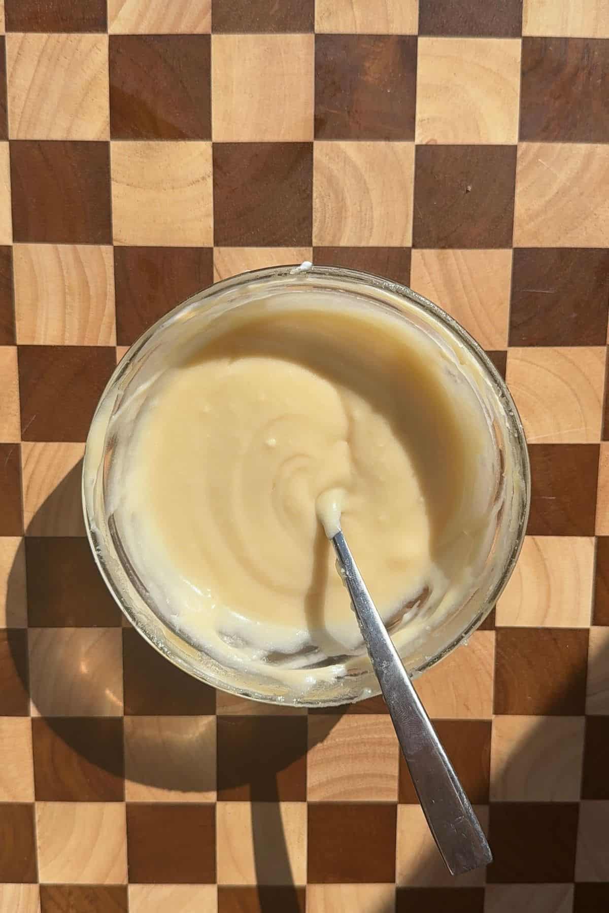 Cream cheese Irish cream icing in a small bowl.