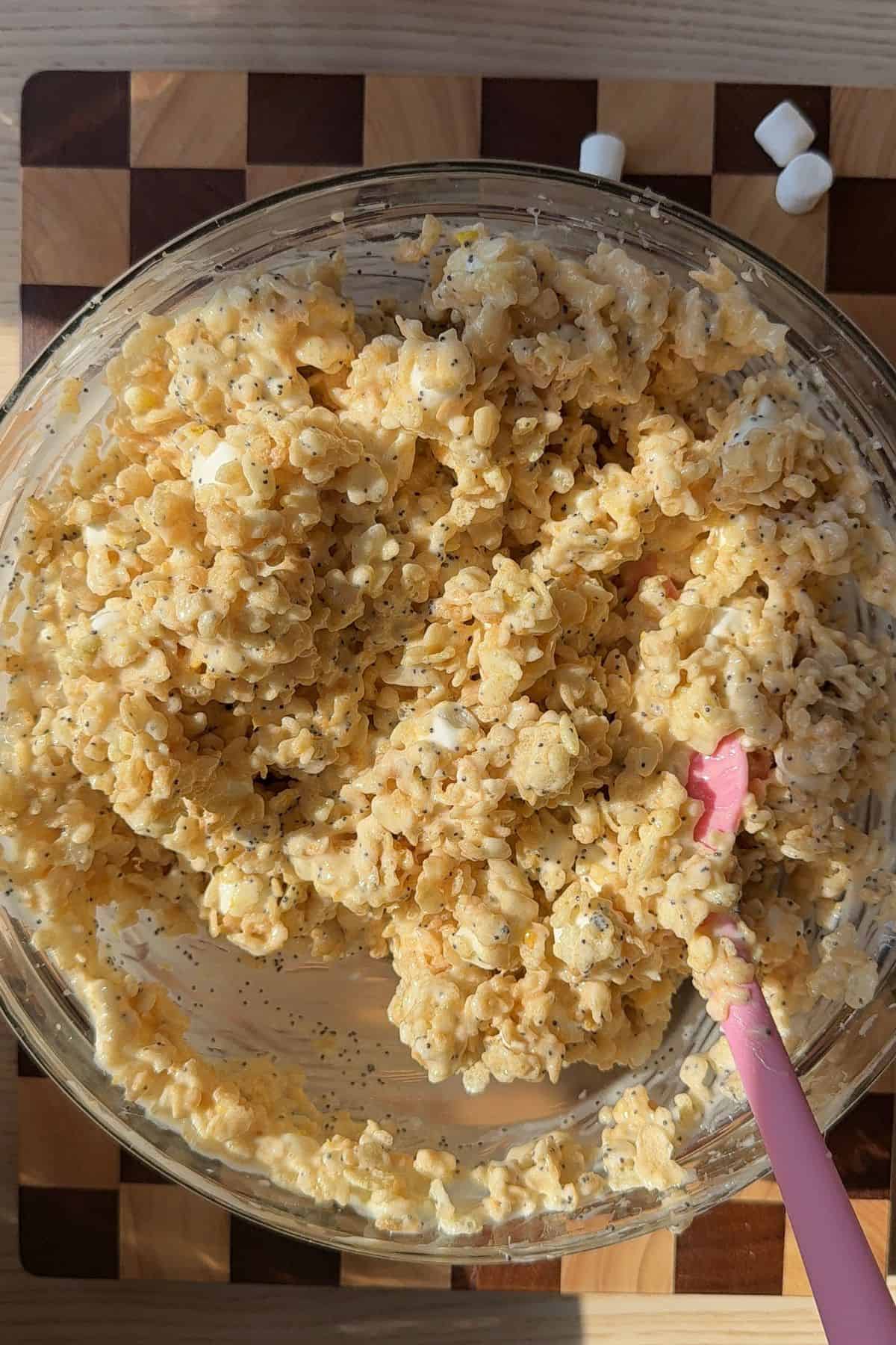 Lemon poppy seed Rice Krispie mixture in a large bowl.