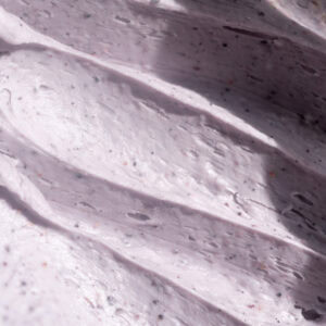 Close up of white chocolate blueberry ganache swirls.