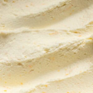 Swirls of whipped white chocolate orange ganache.