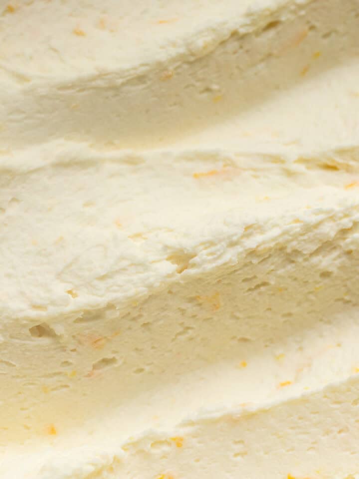 Swirls of whipped white chocolate orange ganache.