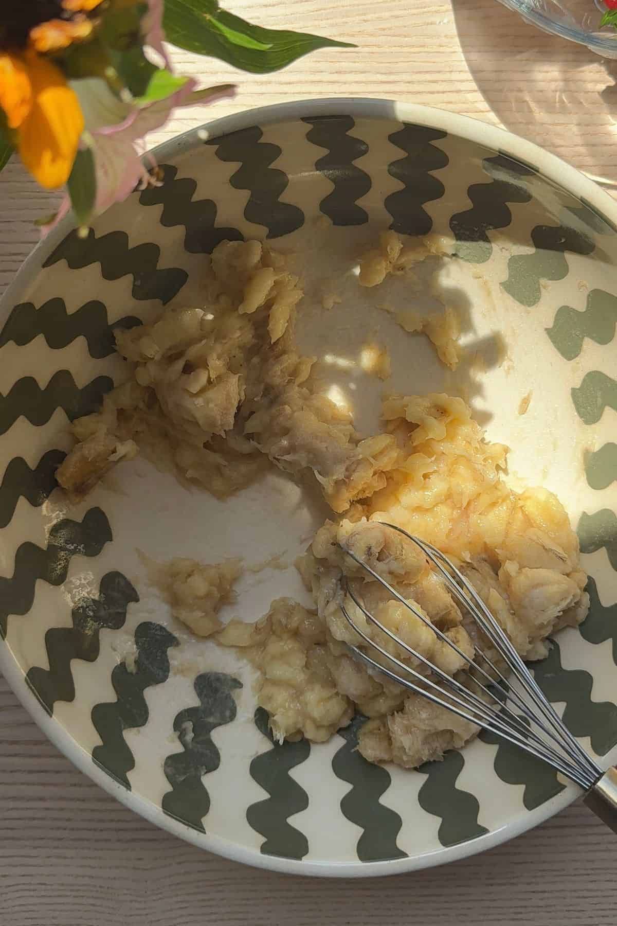 Mashed bananas in a bowl.