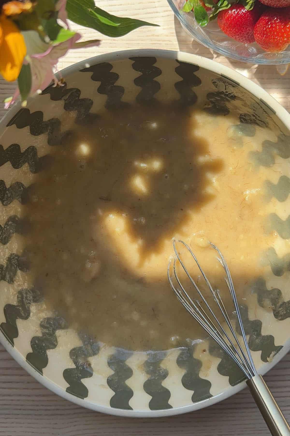 Banana bread batter in a bowl.