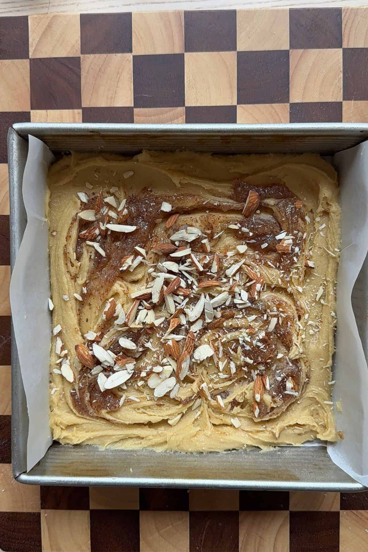 Unbaked blondies in a pan.
