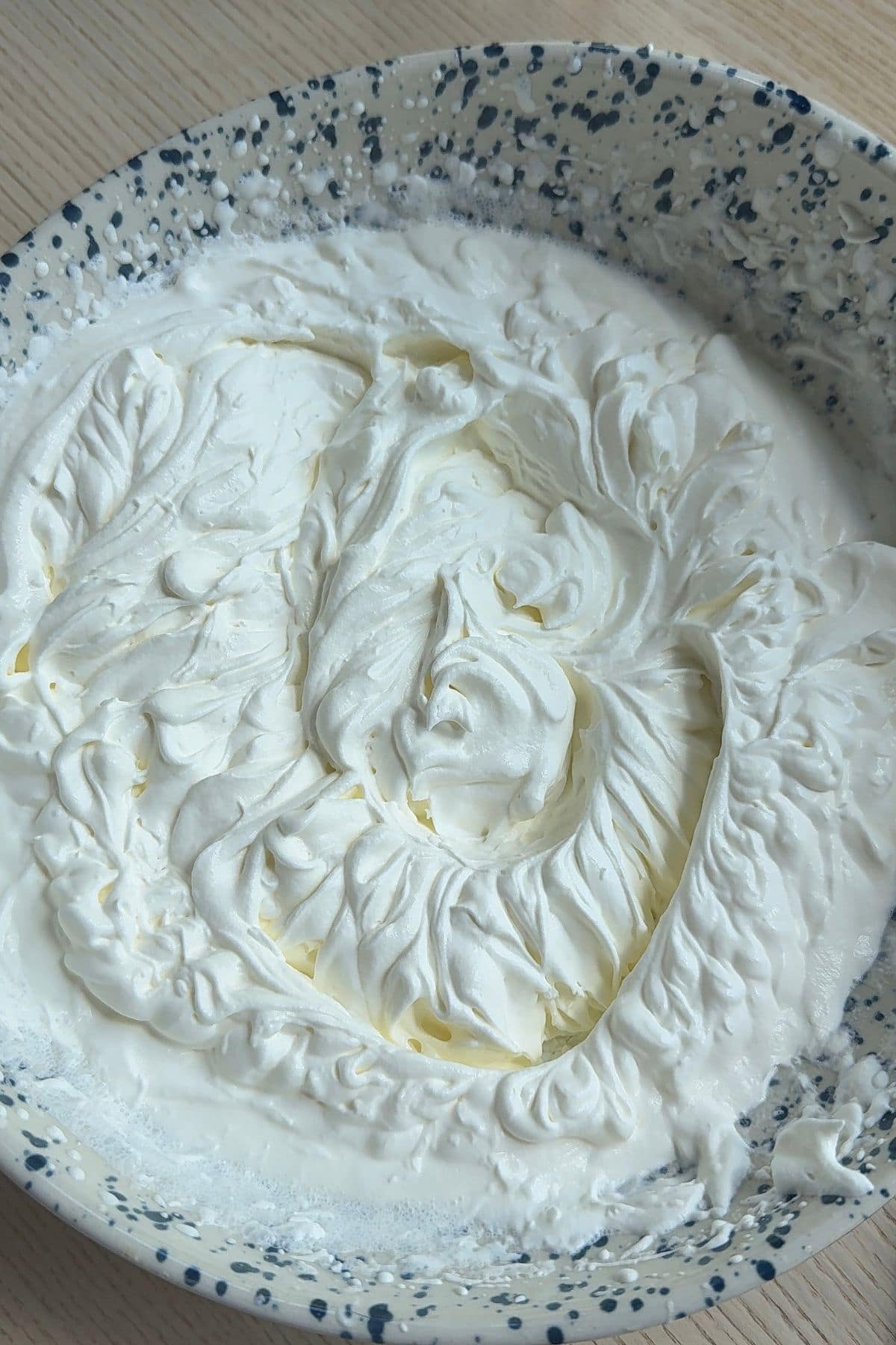 Whipped cream in a bowl.