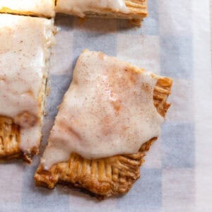 A slice of banana bread pop tart on parchment paper.